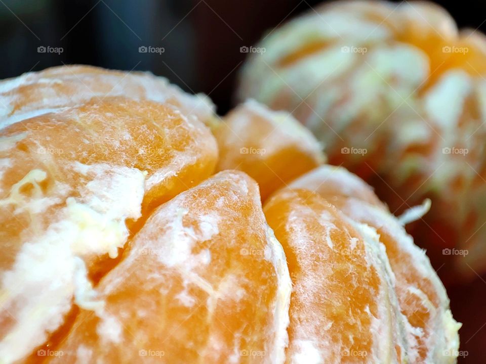 Tangerine /Orange /Fresh fruit/Macro photo of a tangerine /Fruits/Orange colour /Mirrored picture