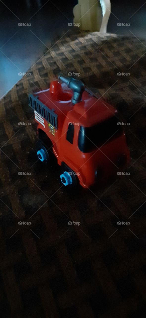toy truck on sofa red chassis