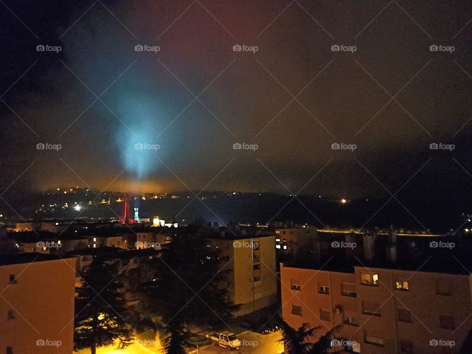 City lights on low clouds