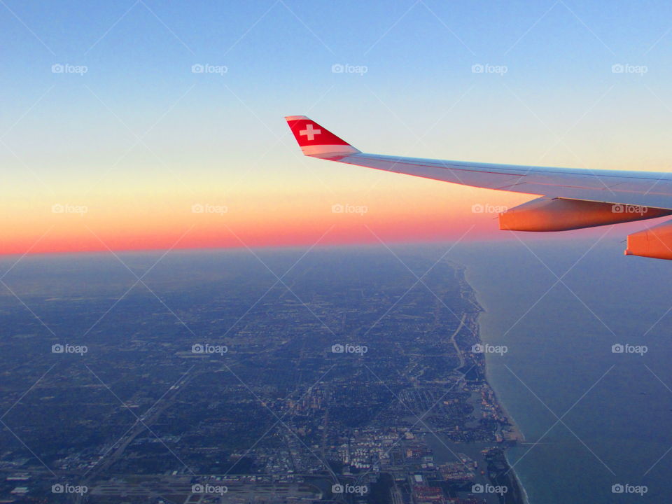 Sunset over the clouds