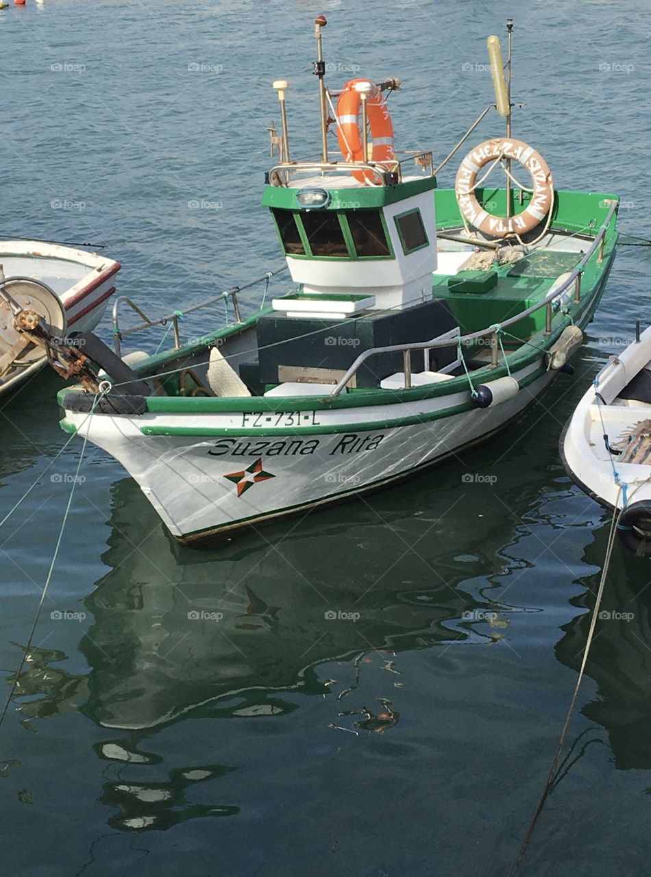 Little fishing boat in harbor 