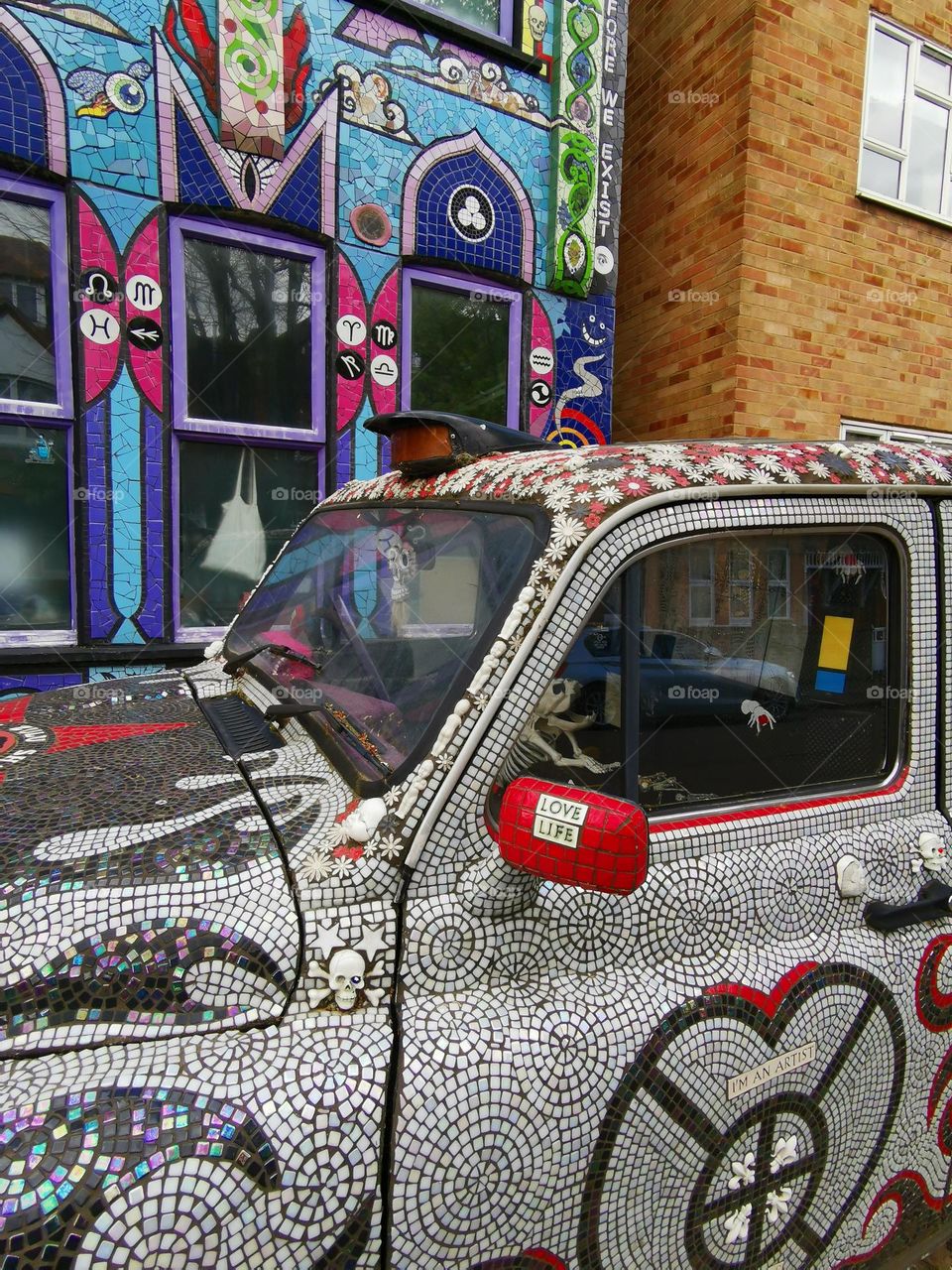 Car with soul. Mosaic car. Unusual car. London streets.