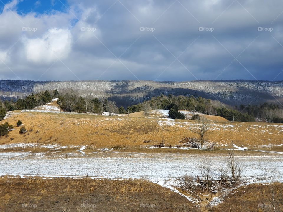 A Mountain View.  A spectacular view through a mountain side unfiltered.