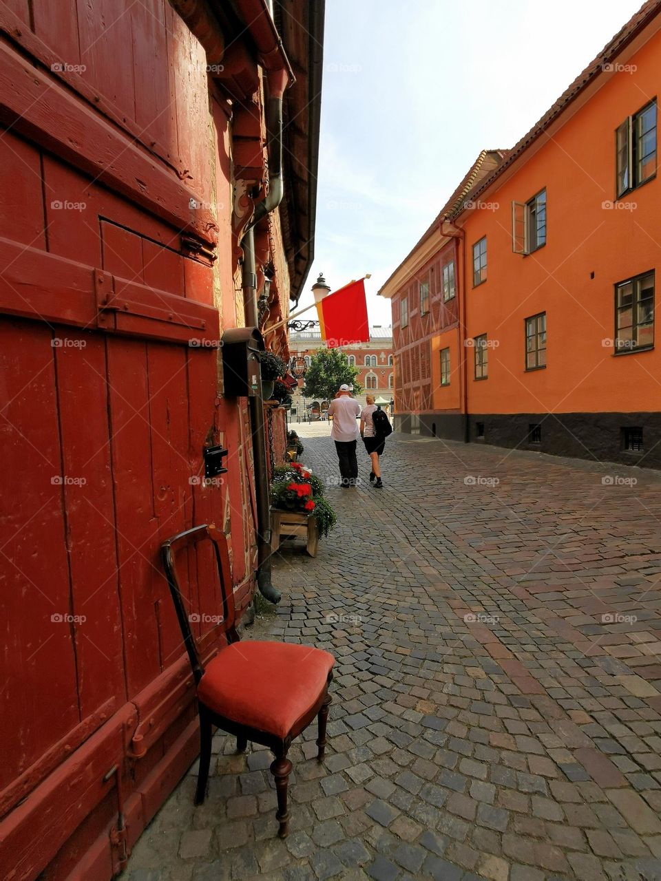 Red chair against red door