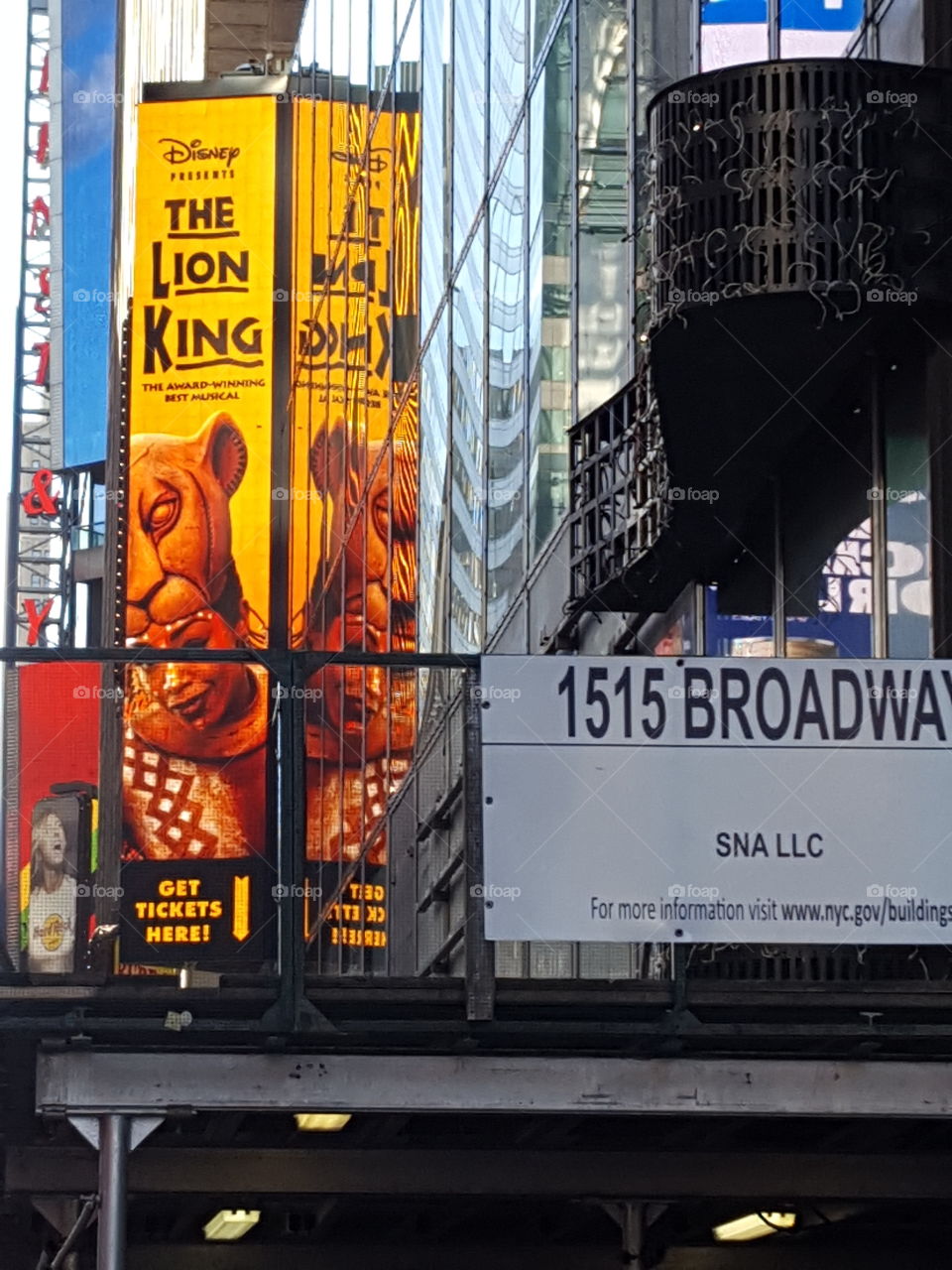 A sign advertises"The Lion King"Broadway stage show in New York City.
