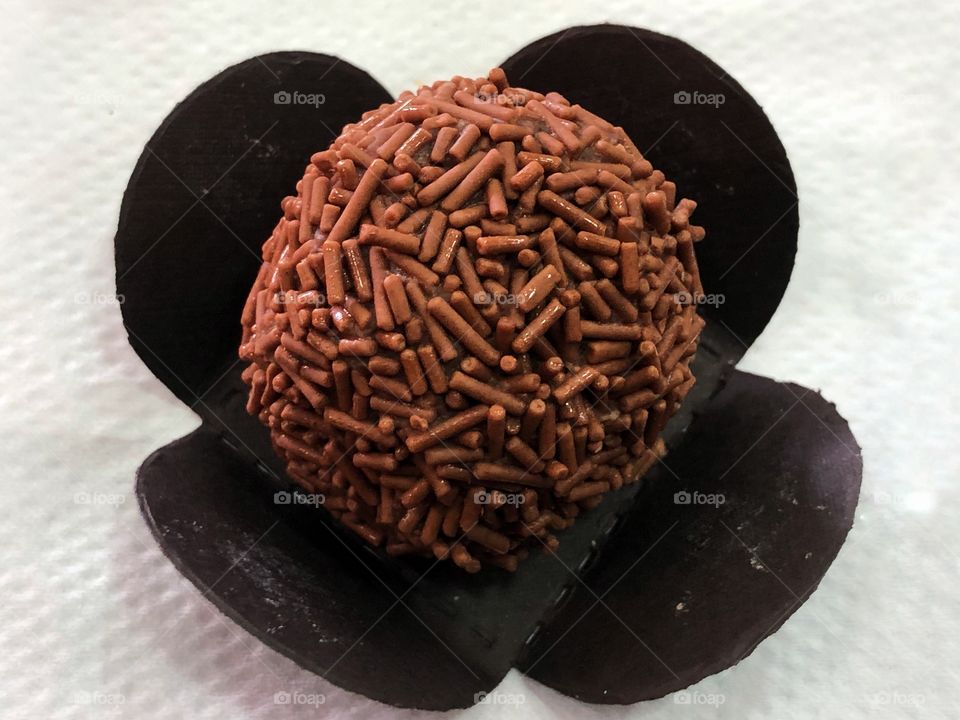 Everyone of us have a favorite sweet. This is mine. It is called Brigadeiro. It is a Brazilian sweet made of chocolate and condensed milk. It is a kind of chocolate truffle with chocolate sprinkles. For anyone with a sweet tooth, like me!