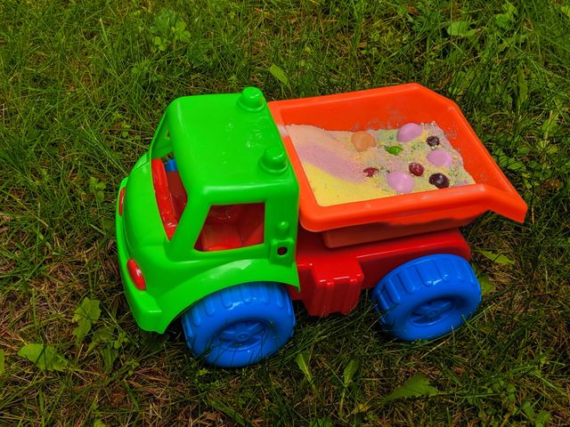 Dump truck full of candy dust and Candy bits