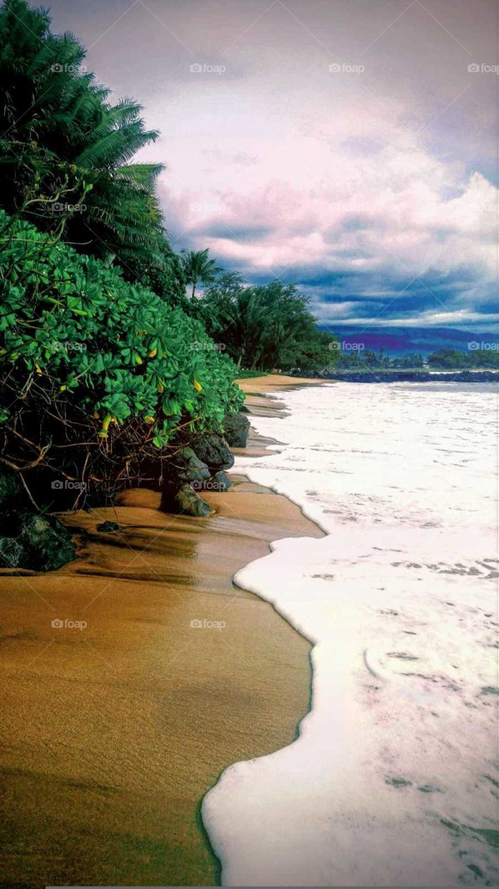 a cloudy day at the beach in Maui