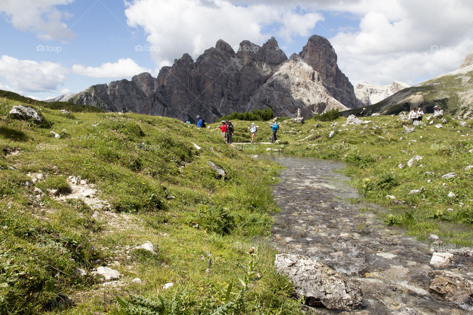 Hiking trail and creek in the mountains 