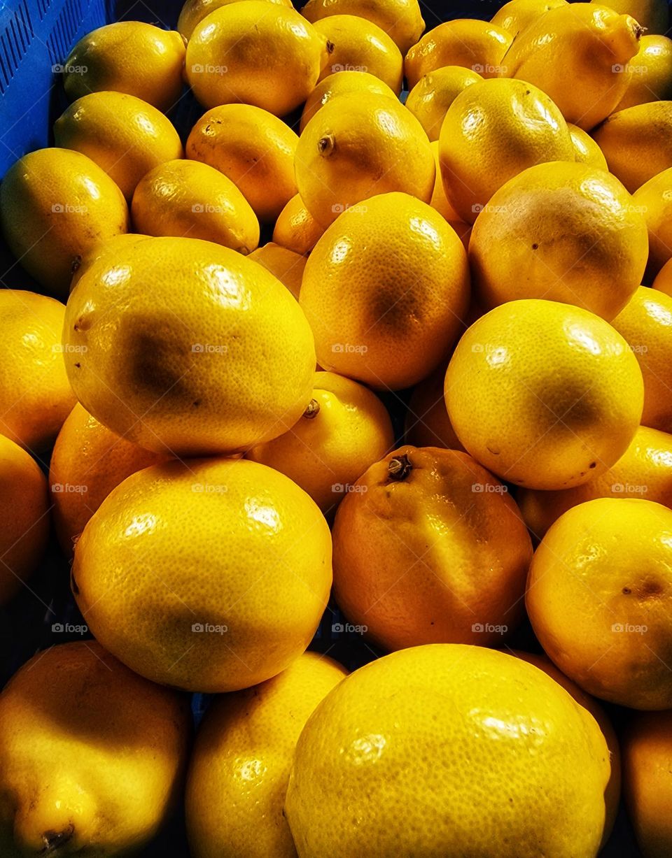 Lemon World. Lemon at the market in the basket.