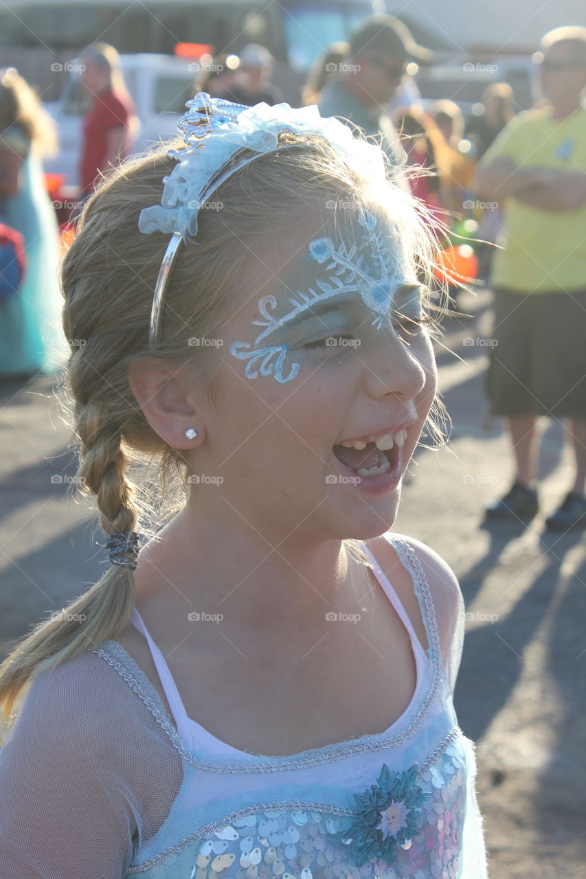 Pure joy. Girl dressed as Elsa for church carnival