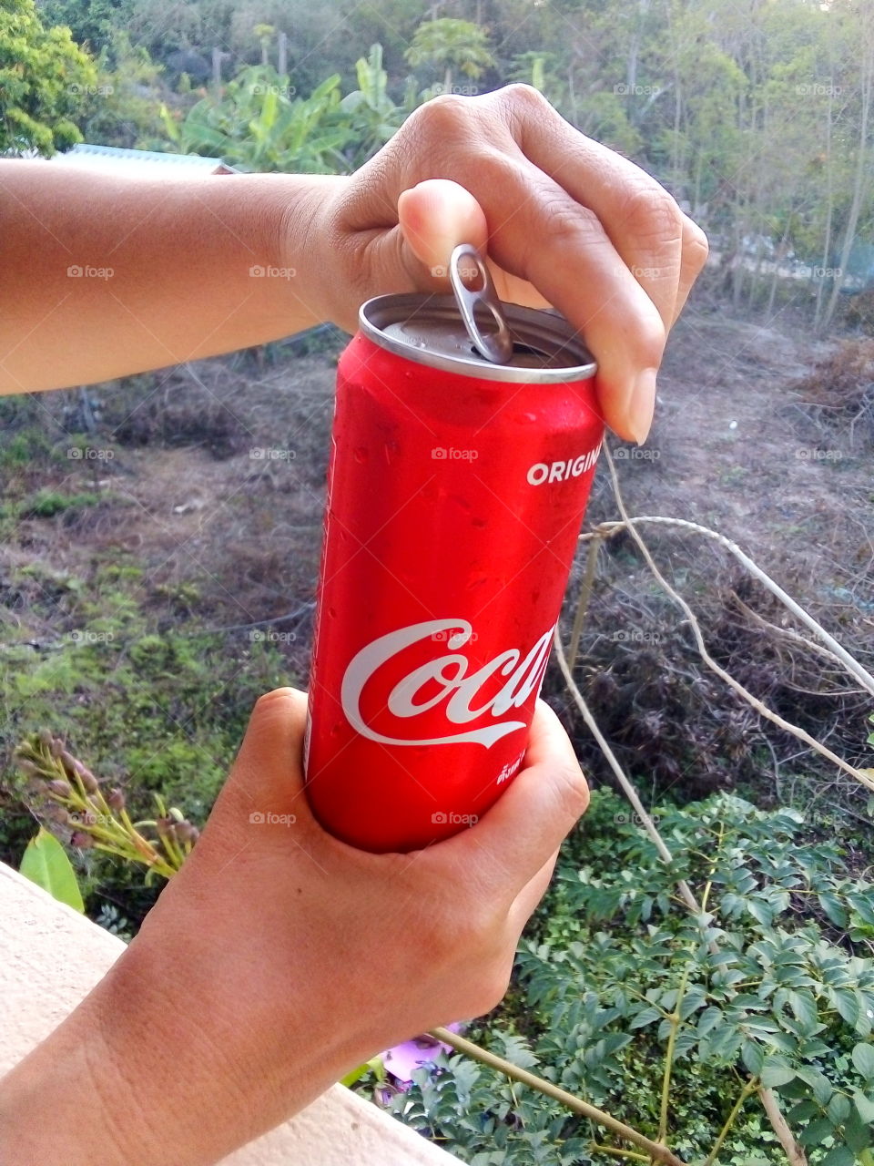 Quench your thirst with Coca-Cola.