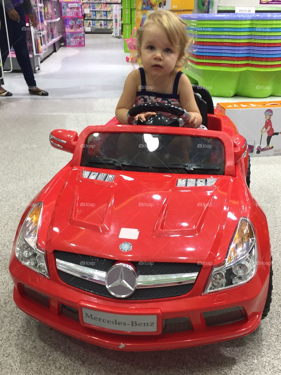 Toddler driving car