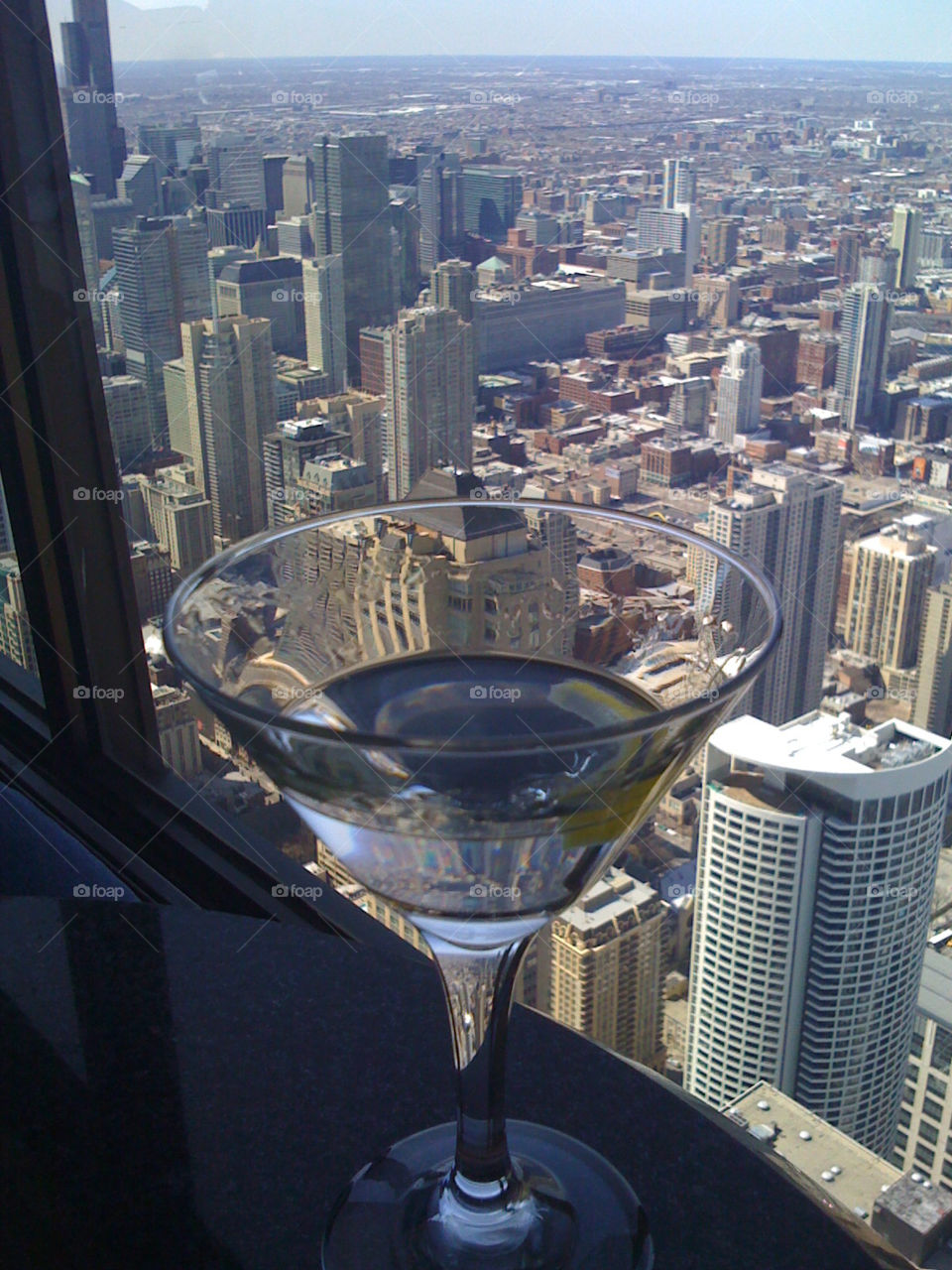martini overlooking chicago john hancock building chicago by Calden44