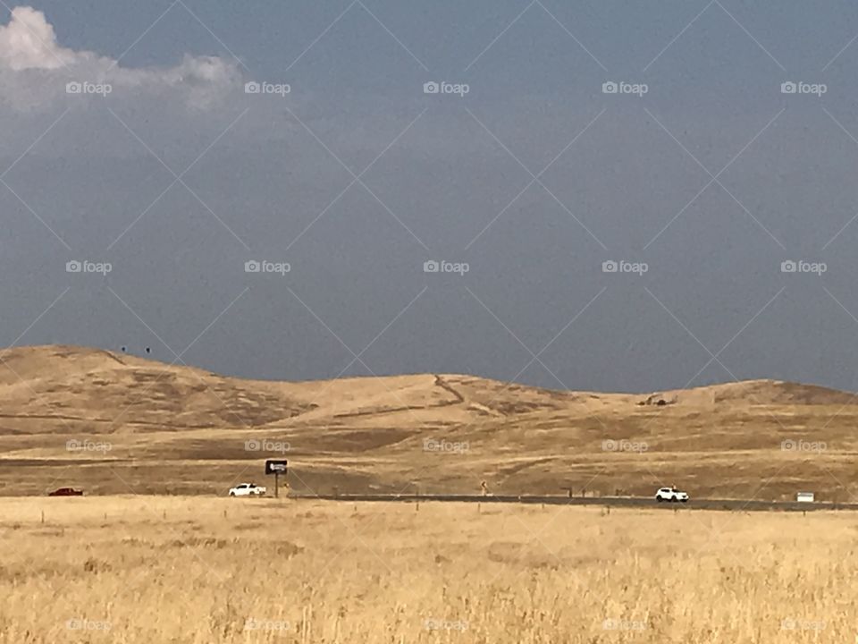 Friant road passing by Lost Lake Recreation Area. When driving on this road, one can see and appreciate the intriguing natural landscapes on both side of the long road.
