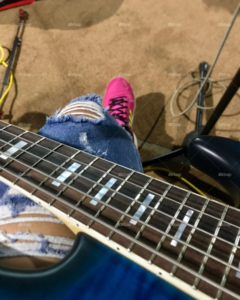 A photo of a bass and sneakers.