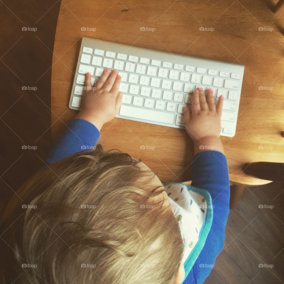 Toddler on a keyboard 