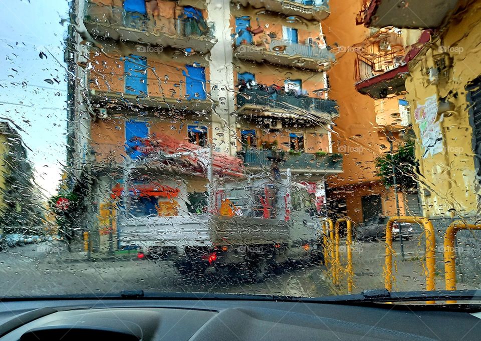 View from a car on a rainy day in the city