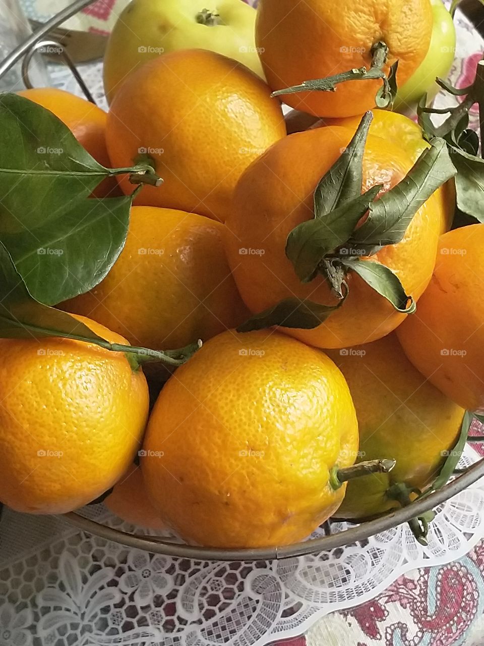tangerines, autumn harvest tangerines, fresh from a branch
