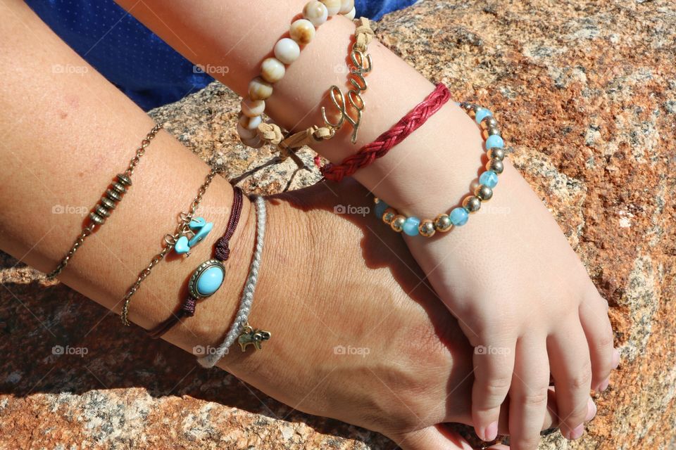 Mom and daughter wearing bracelets