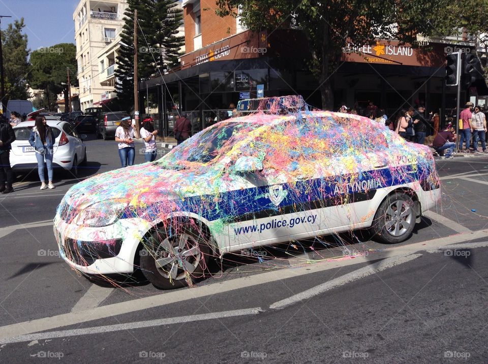 Limassol Carnival 2017.  Police car covered in spray.
