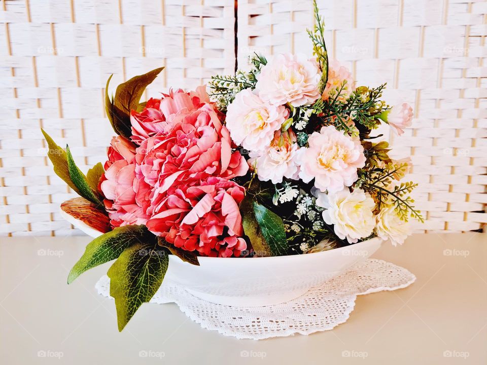 shabby chic centerpiece with pastel colored flowers