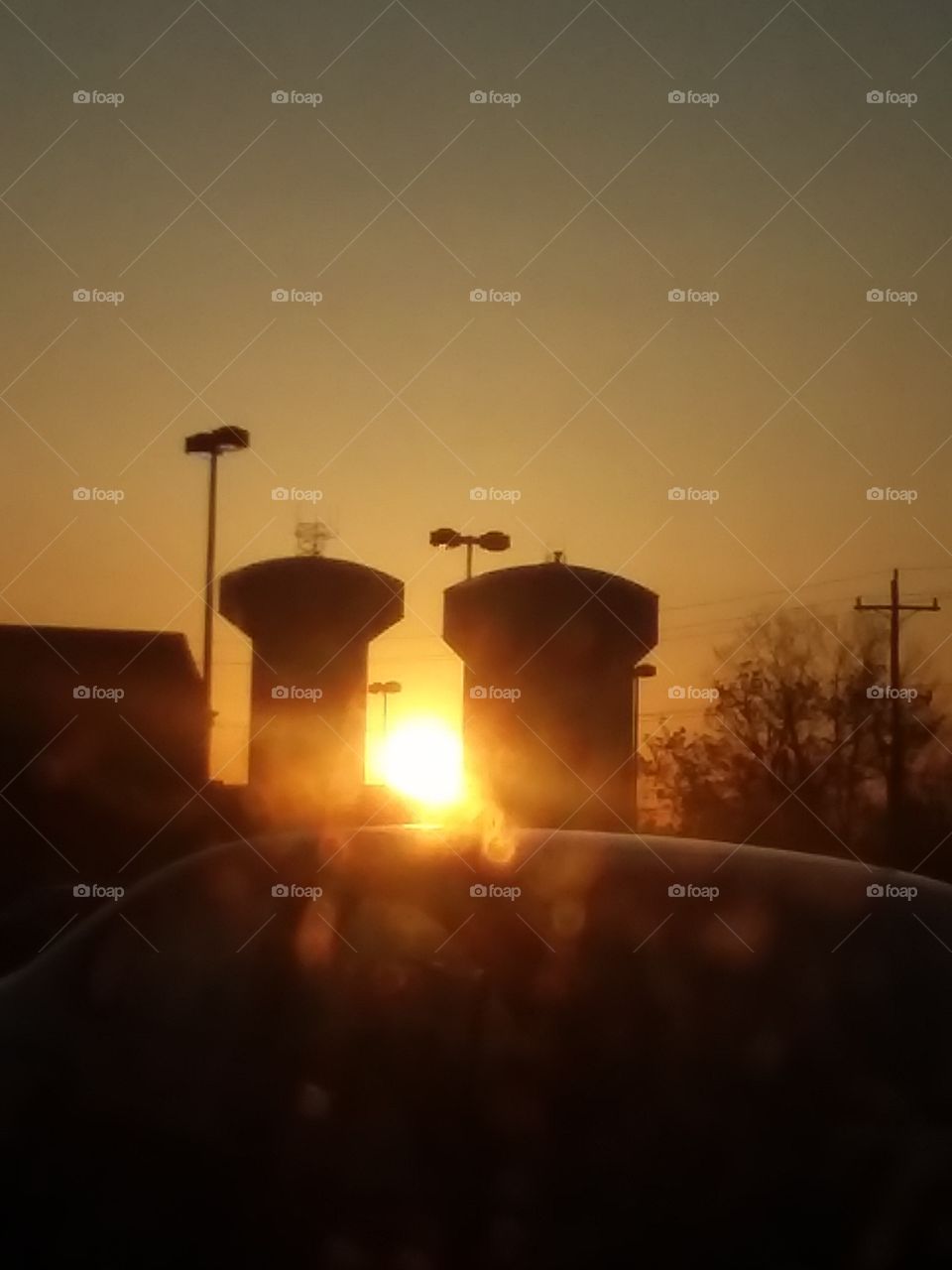 Sundown between two water towers