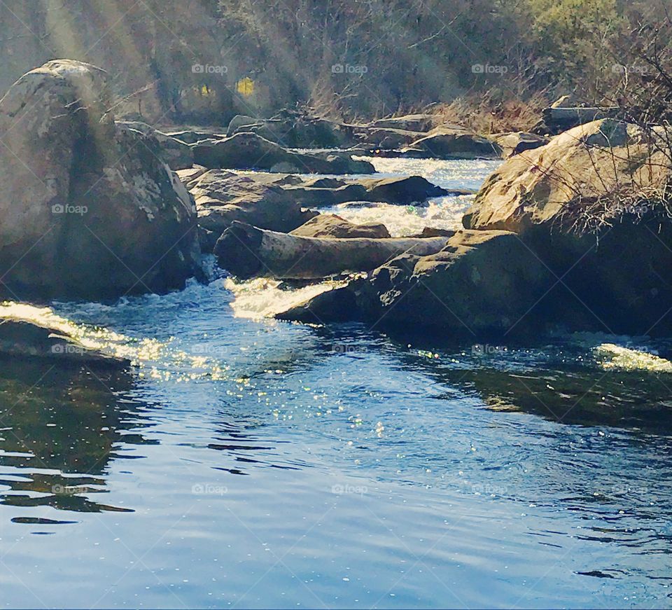 Sunlight on River Rocks