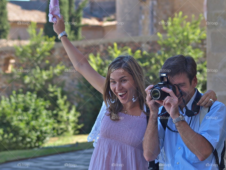 Smiling couple with the camera