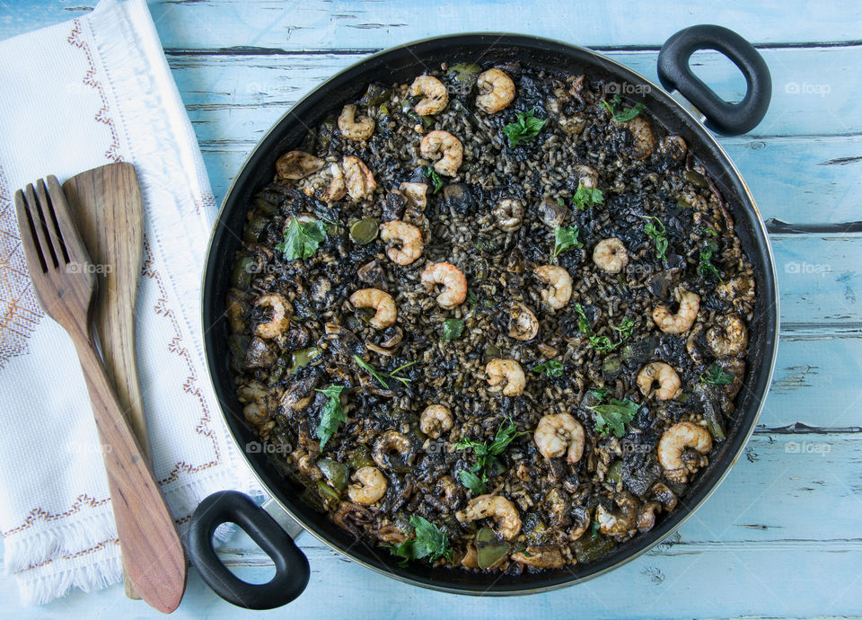 Black rice with cuttlefish and prawns (arroz negro con sepia y gambas)