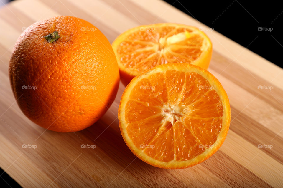 Orange fruit healthy. Organic - Full and sliced.
