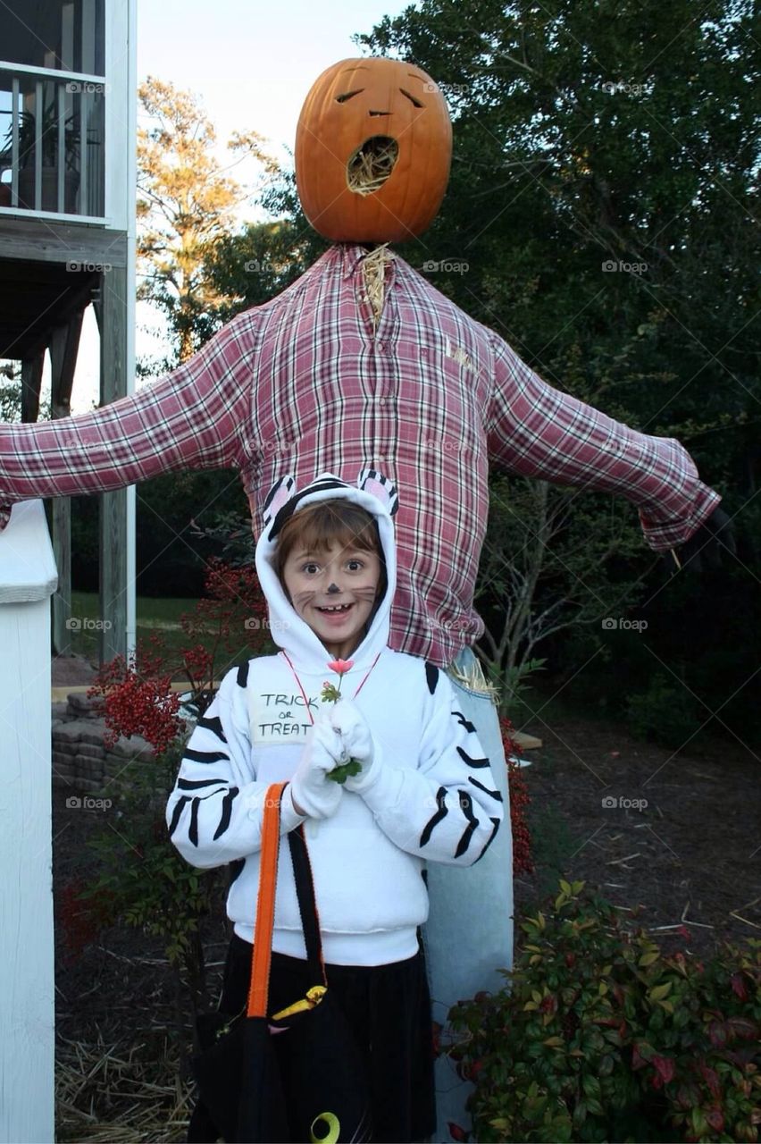 White Tiger kid with Pumpkin Man