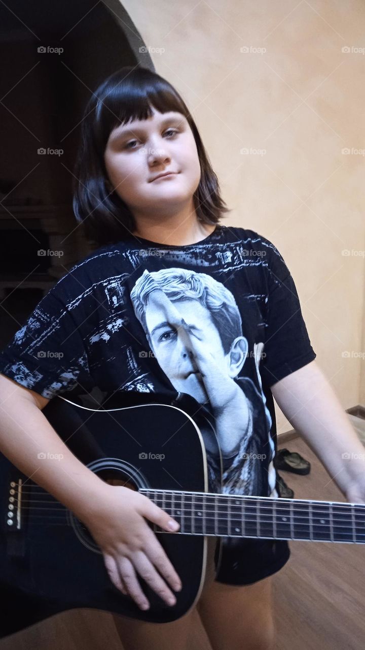 young girl with guitar🎸