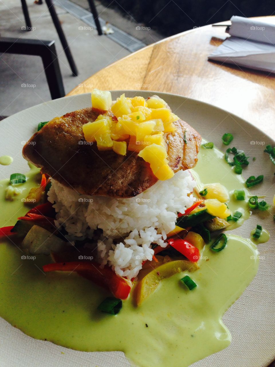 High angle view of fish with rice on plate