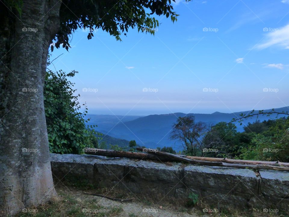 The peaceful colors of the mountain at daybreak for a holiday in harmony with nature.