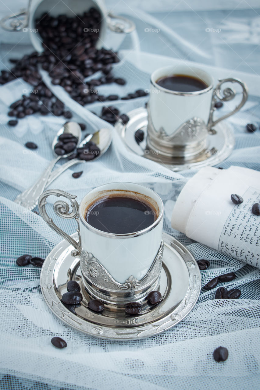 Coffee in a decorated small cups.