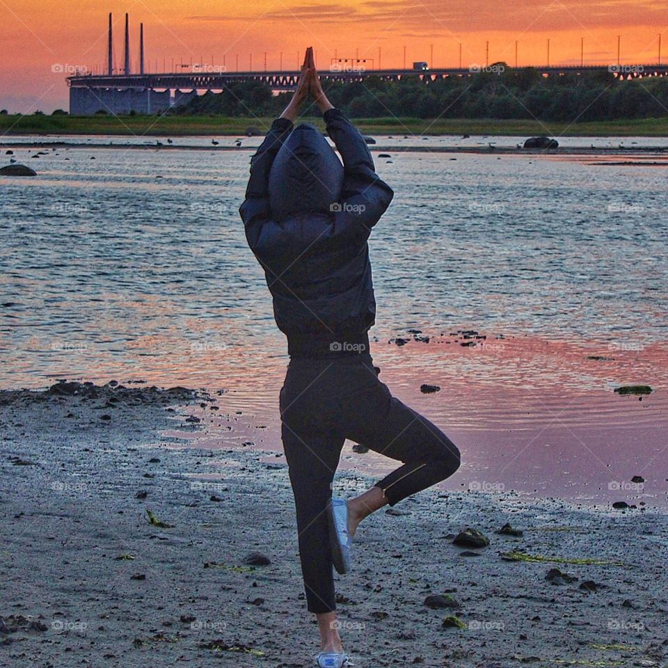 Posing by the bridge