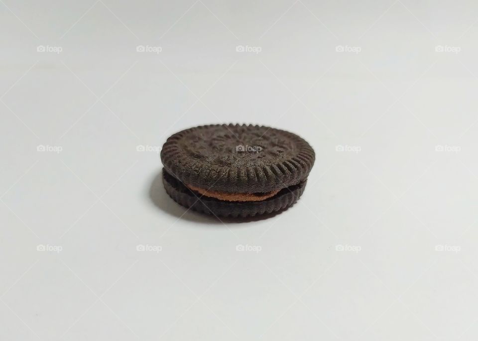 a biscuit sandwich with chocolate cream in it