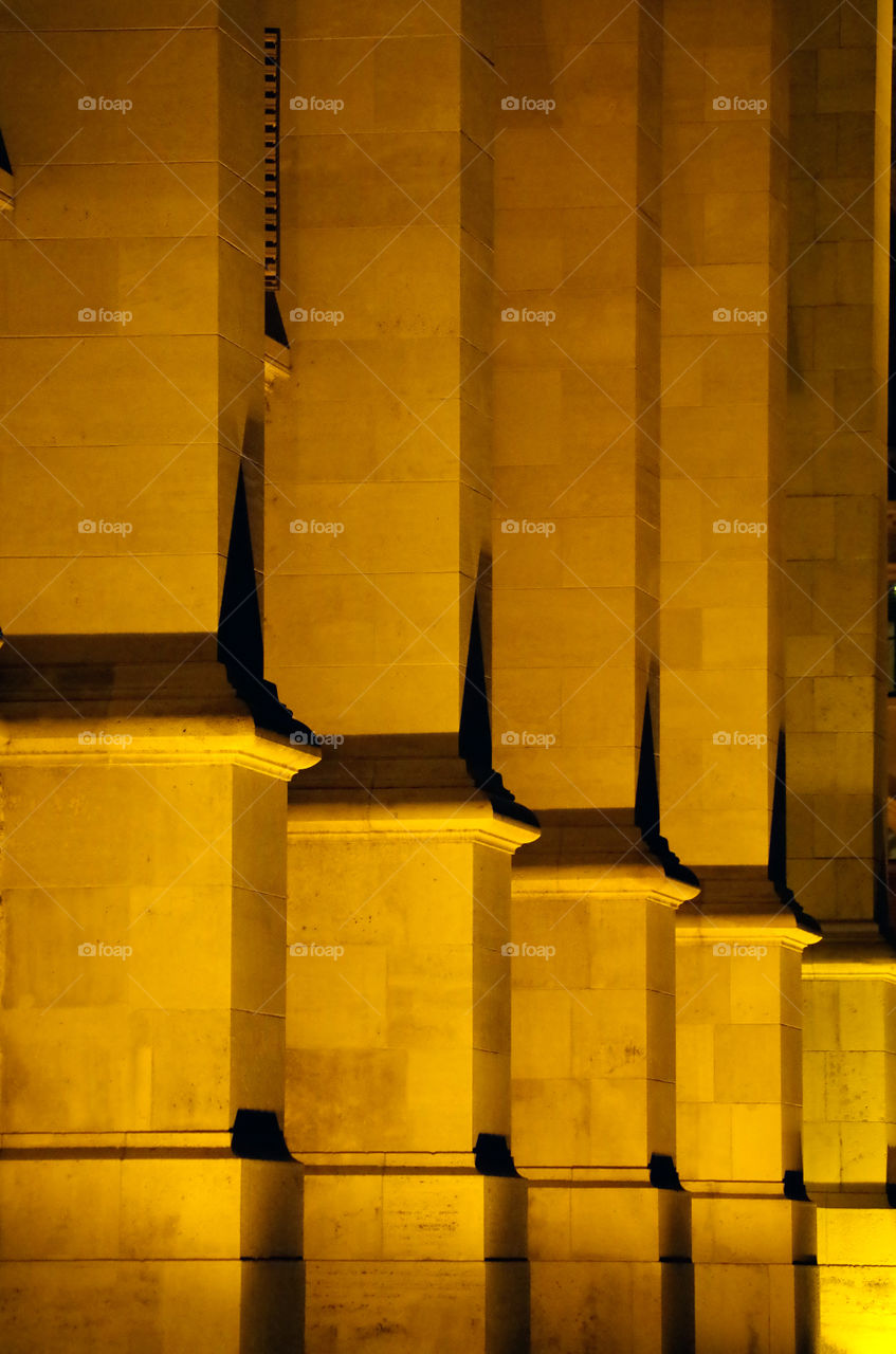 Illuminated columns at night in Budapest, Hungary.