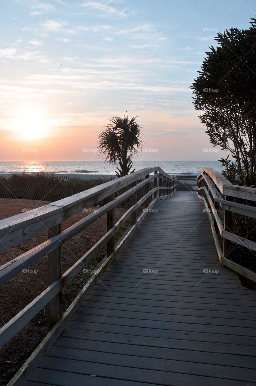 Walkway to the beach at sunrise in South Carolina.