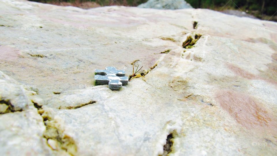 Puzzle on rock