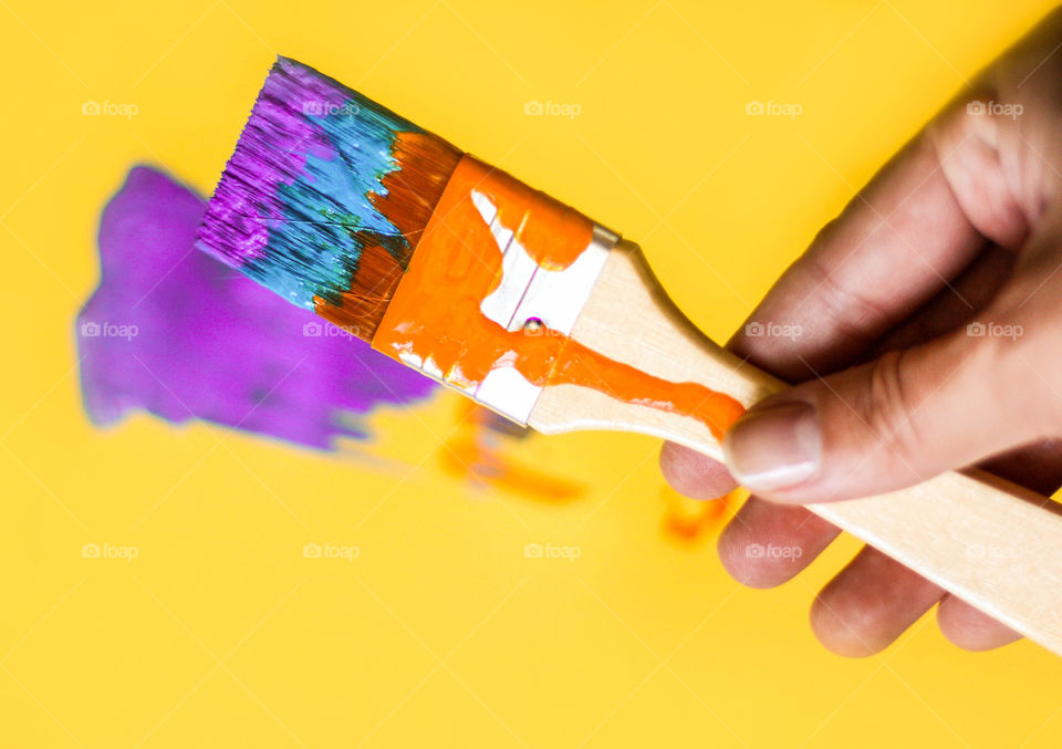 Painting your life! Colorful paintbrush in my hand