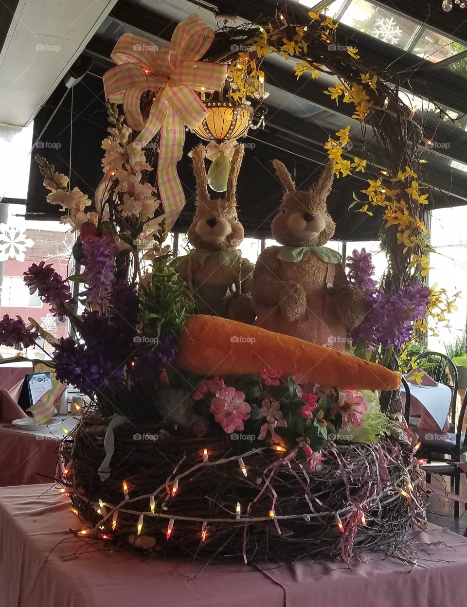 Easter basket with two bunnies in it