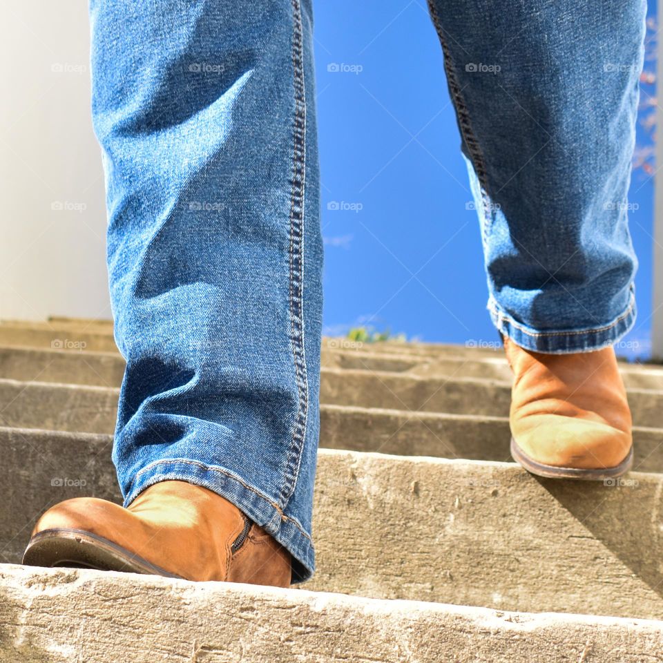 Man woman walking down the stairs 