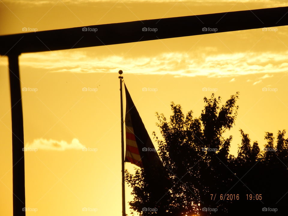 Sunset flag & clouds