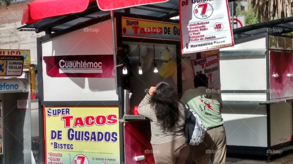 Eating tacos at Mexico City. Taquería at Plaza de la República"s metrobus station