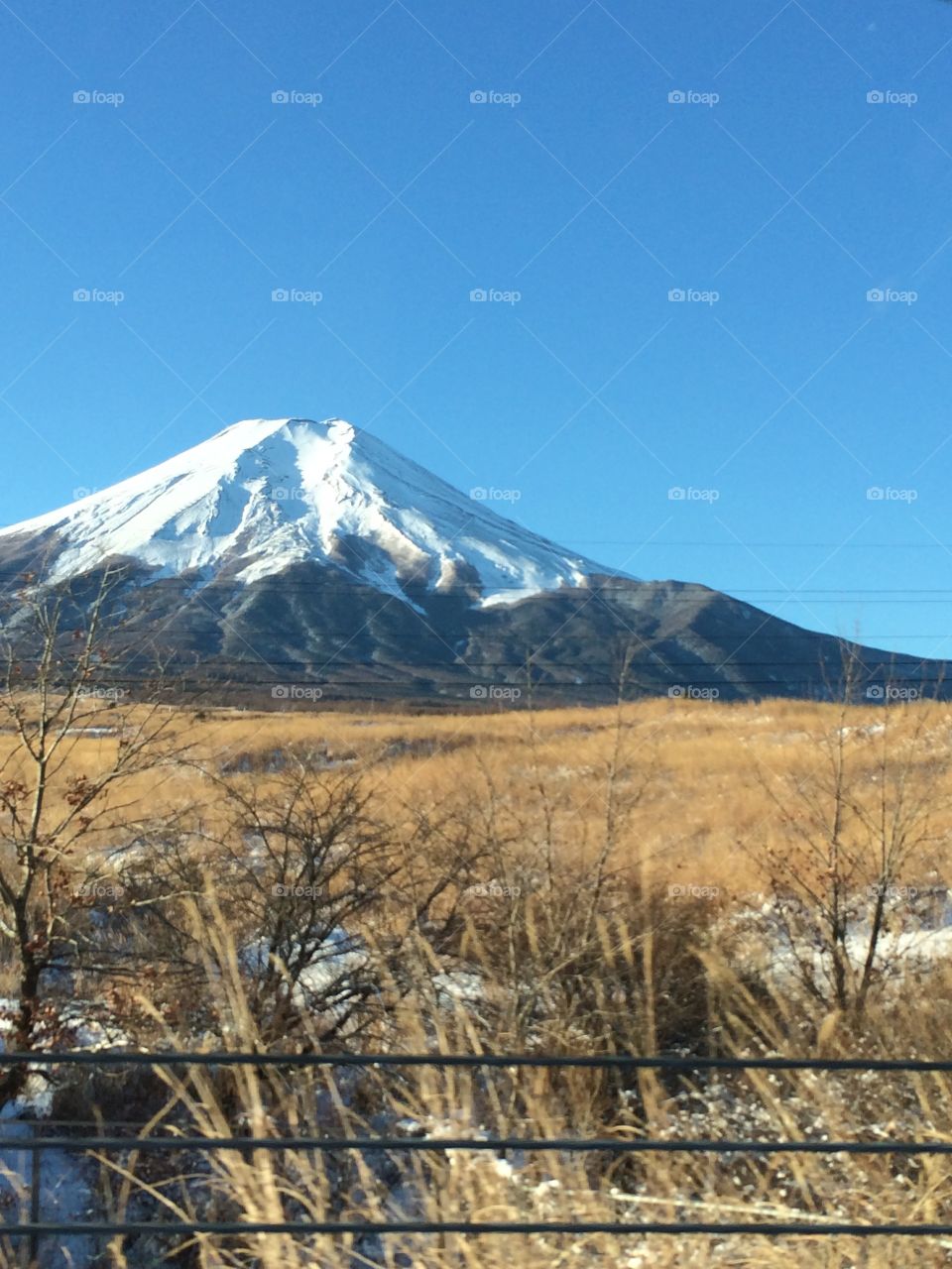 Fuji San!. A picture of Mount Fuji while on a road trip. You can see it from pretty far away and it's always looking great.