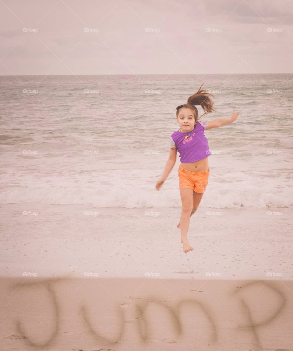 Jump. Jump at beach

