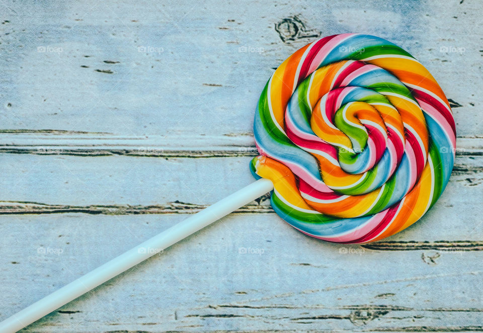 Brightly coloured lollipop.