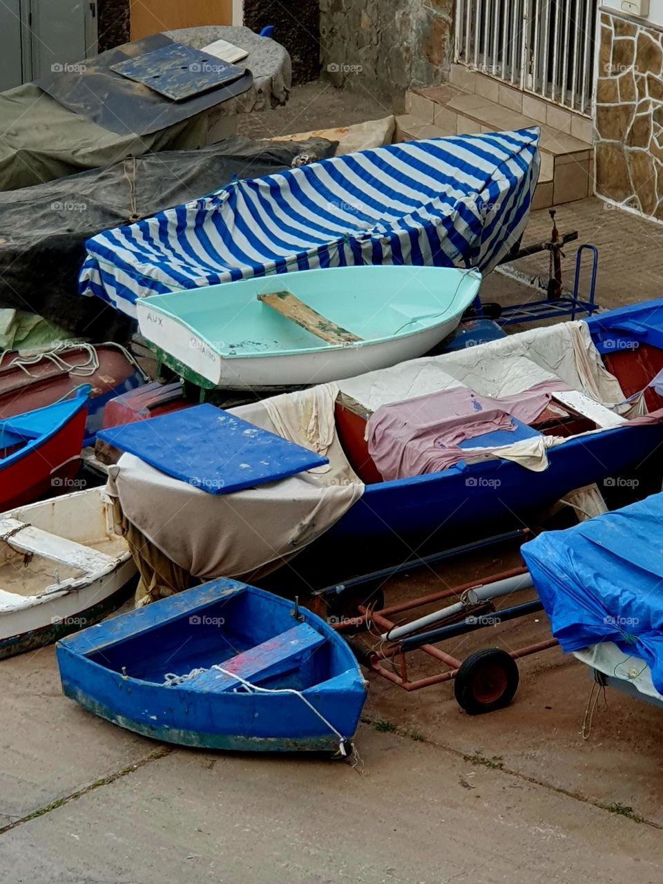 blue boats ashore